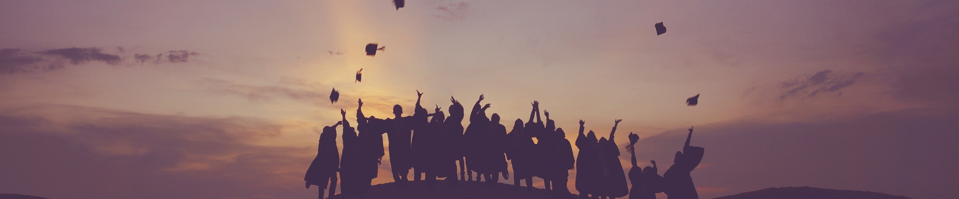 Graduation Students with sunset